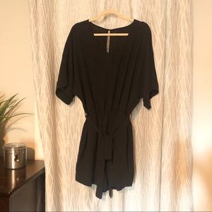 Black v-neck romper with tie waist